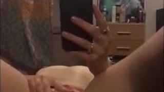 Young Tattooed Slut spreads her pussy and masturbates