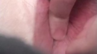 Young teen uses a spoon as a dildo