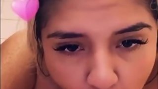 JuicyK sucking pink dildo