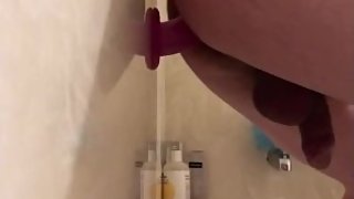 Teen boy rides dildo and jerks off in shower